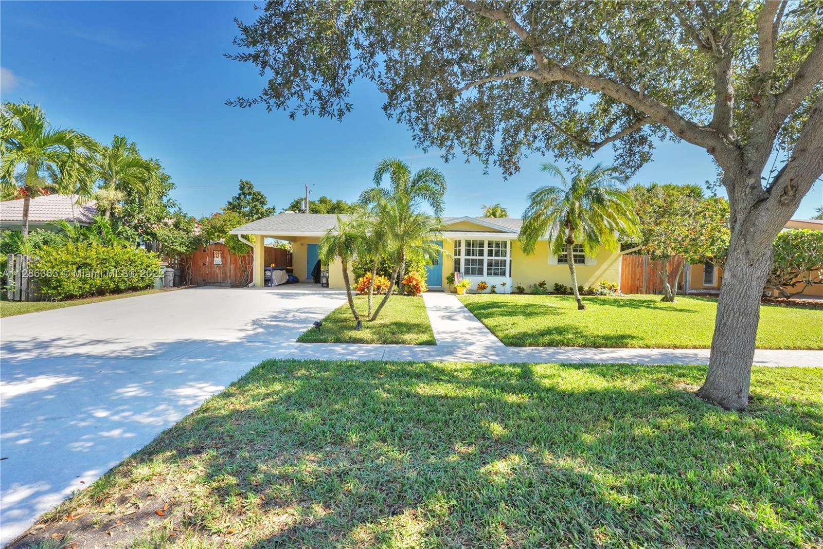 Stunning 3 bedroom, 2 bathroom home located in desirable Lighthouse Point featuring a split floor pl