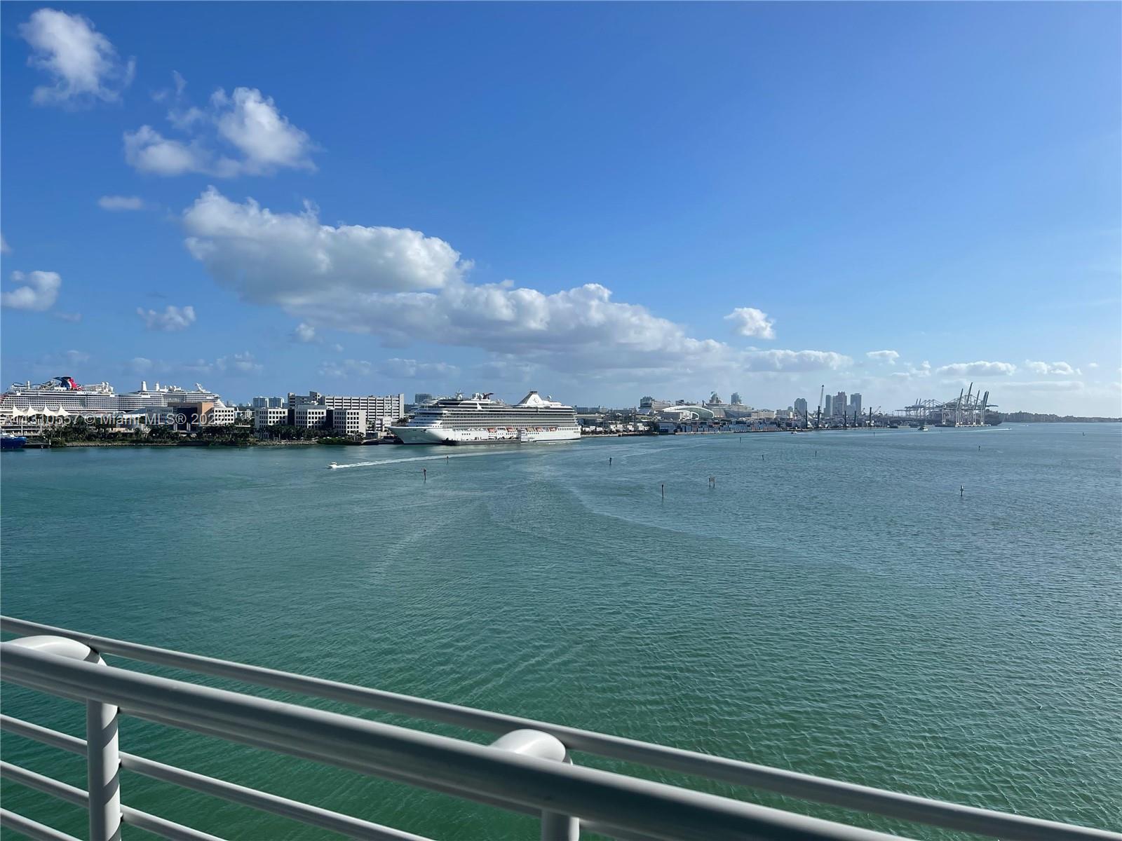 Spectacular direct views of beautiful Biscayne Bay, the Miami River, Port of Miami & Bayfront Park. 