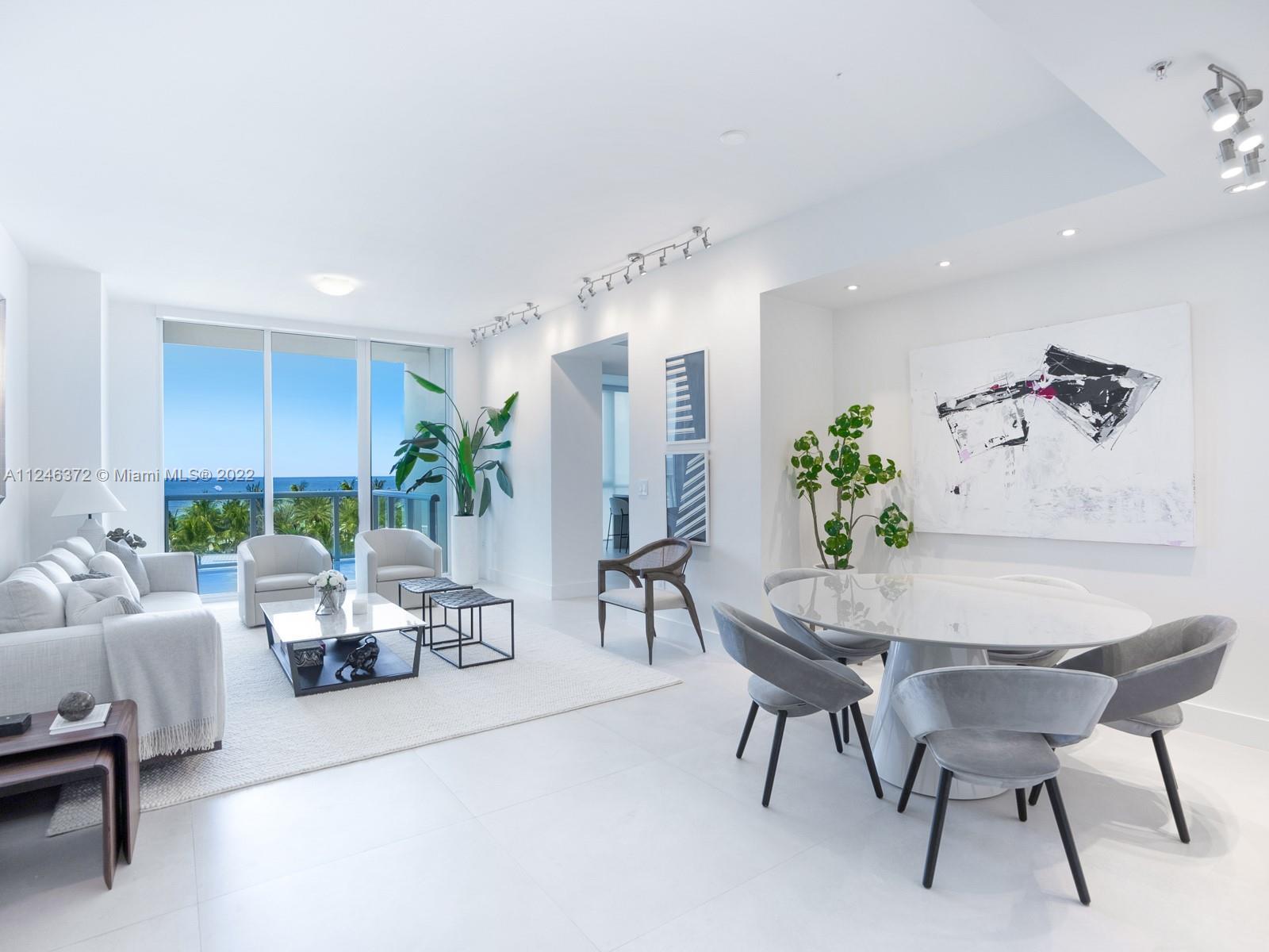 Step Inside With Me! This direct oceanfront modern residence represents a rare 2 Bedroom + Den, 3 fu