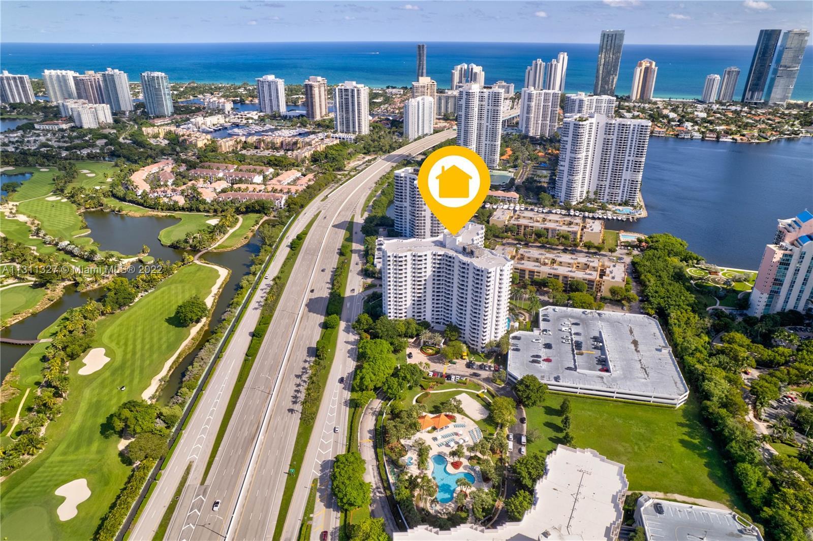 Beautiful views from this 2-bed 2-bath unit at Parc Central Aventura East Condo. Living Room and bed