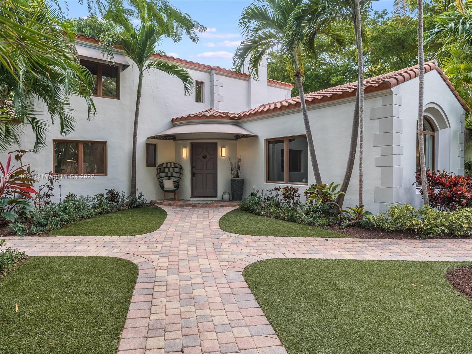 Rare opportunity to own a classic Miami Beach home tucked away on a quiet street in the highly desir