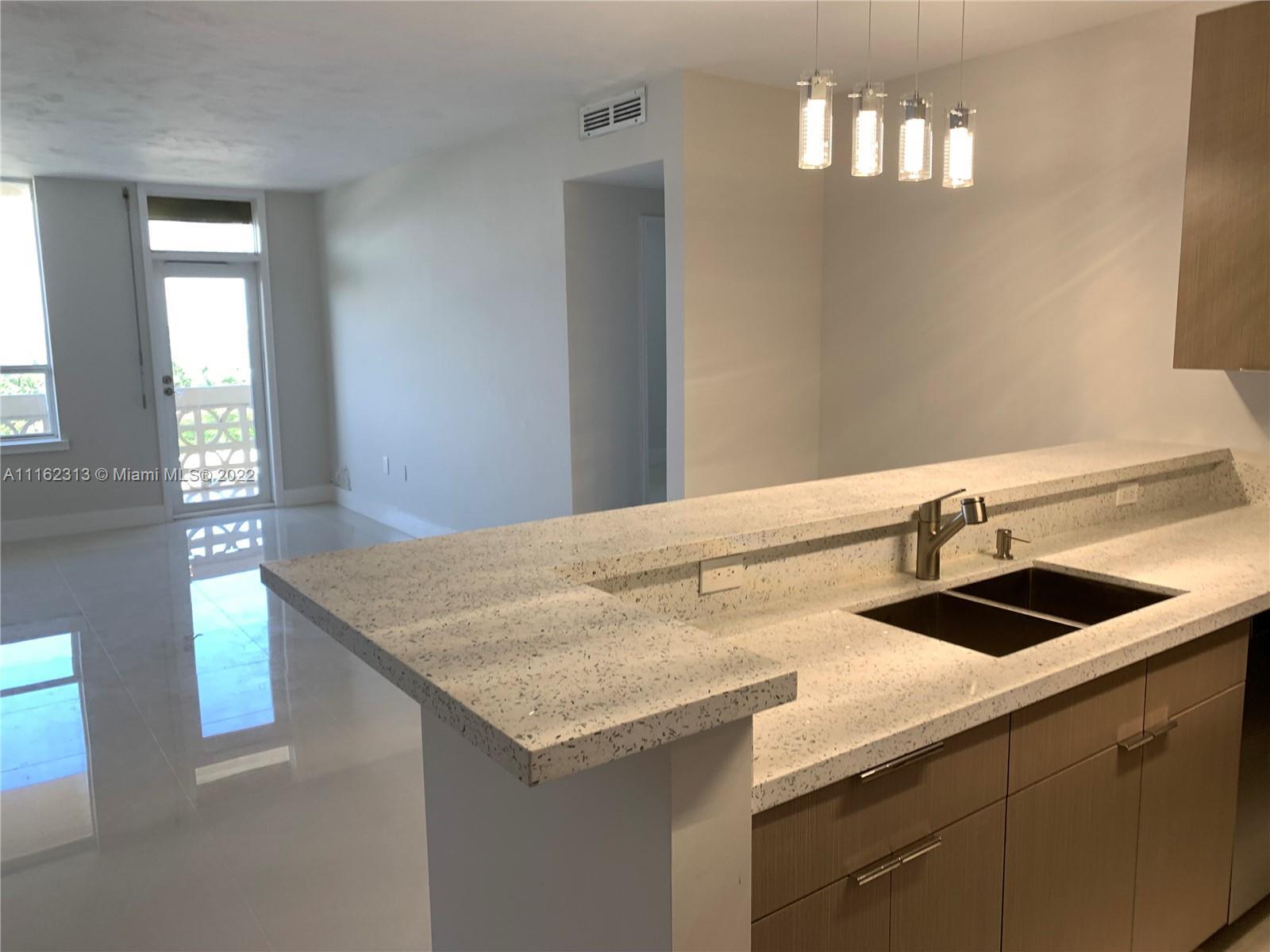 Completely renovated unit in an oceanfront building in Bal Harbor. This 1 Bedroom/DEN & 2 full baths