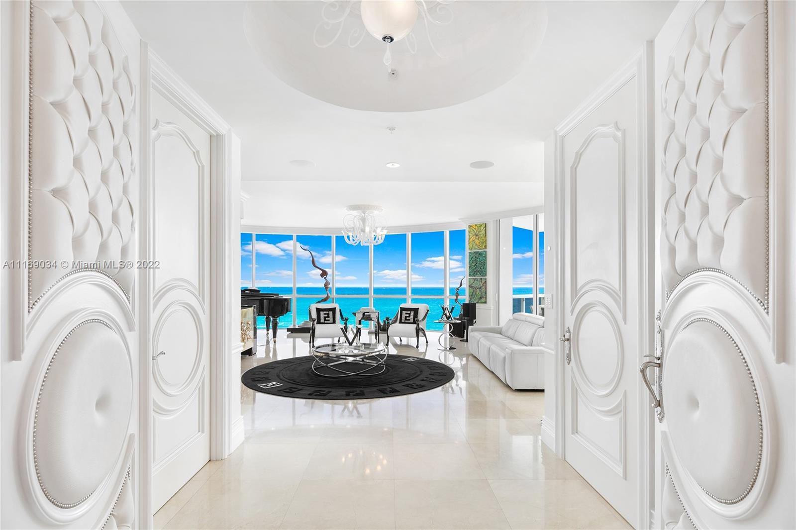 Welcome to the ultra-luxurious oceanfront condo at the prestigious Trump Palace in Sunny Isles Beach