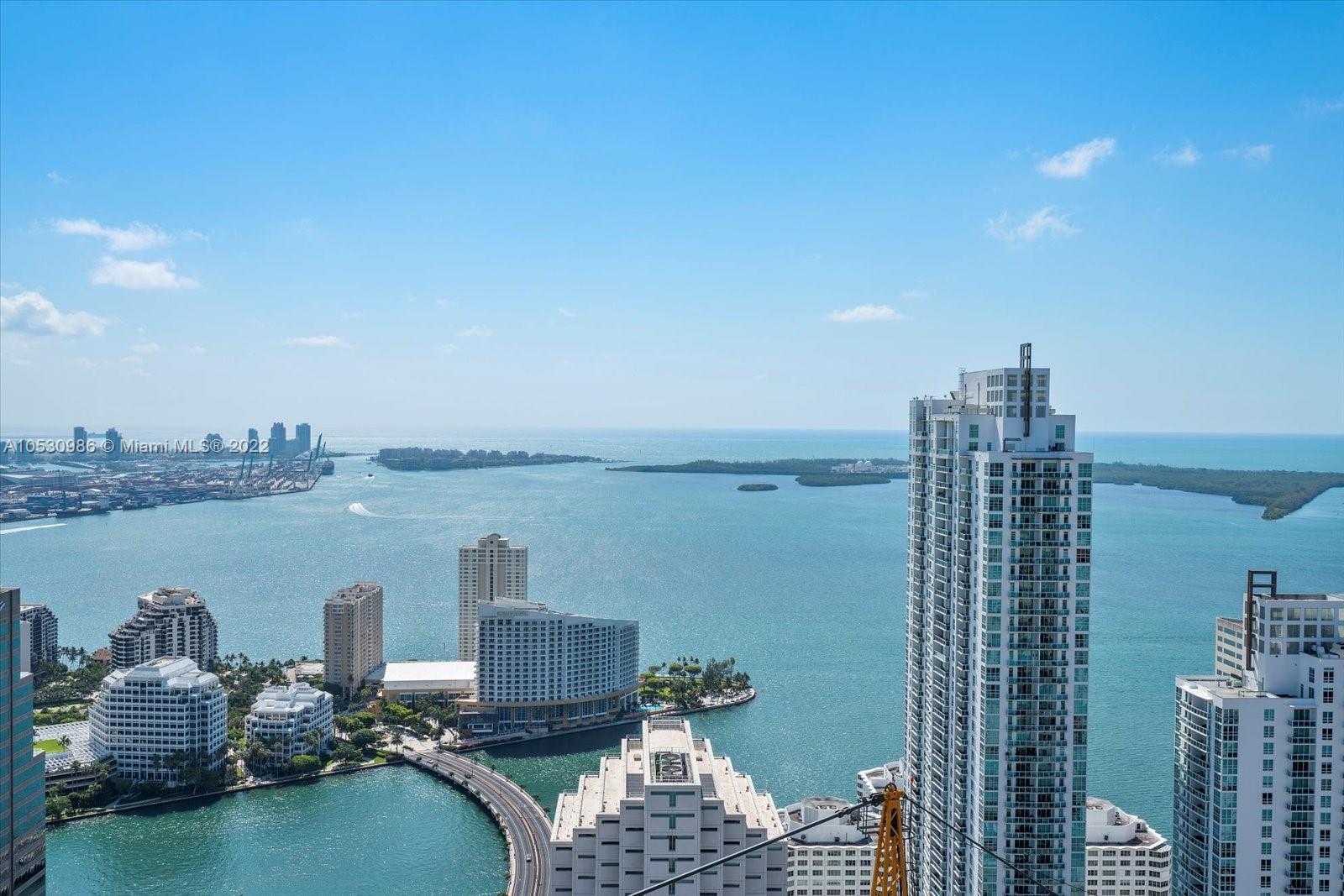 This unit 5505 high floor direct bay view enjoying the sunrise across Biscayne Bay, and at night Mia