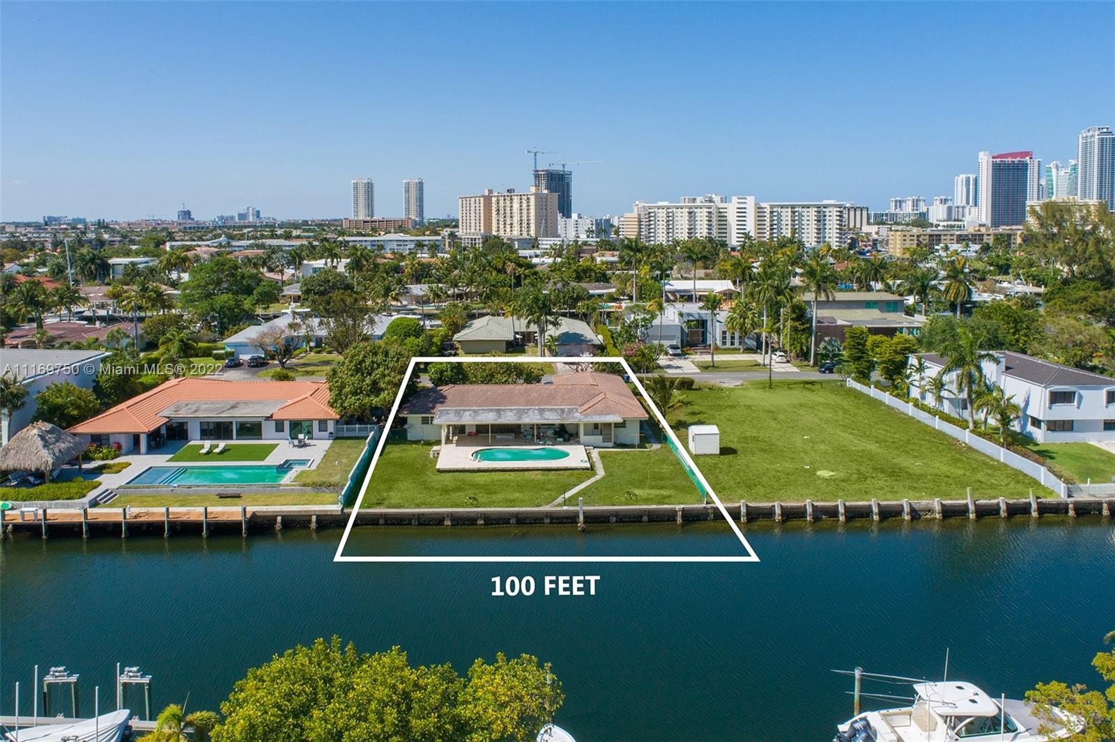 Impressive large lot with 15,000 sq.ft. and 100 feet of waterfront on deep-water with no fixed bridg