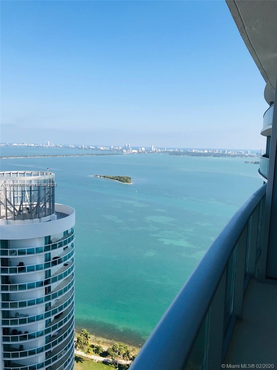Spectacular View to the Bay and Miami Beach from this 44th Fl, Spacious 1 Bed + 2 Full Baths +DEN Co