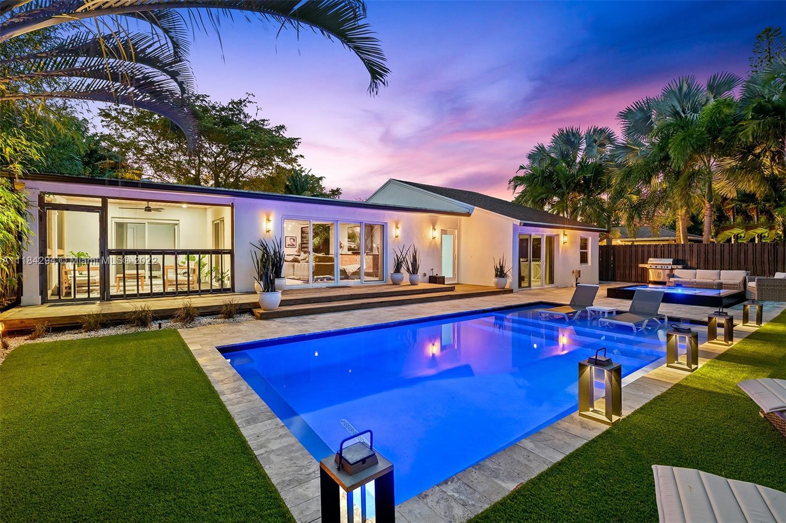 Welcome Home to your Wilton Manors Modern Farmhouse STUNNER! Outdoor Resort Style Oasis with picture