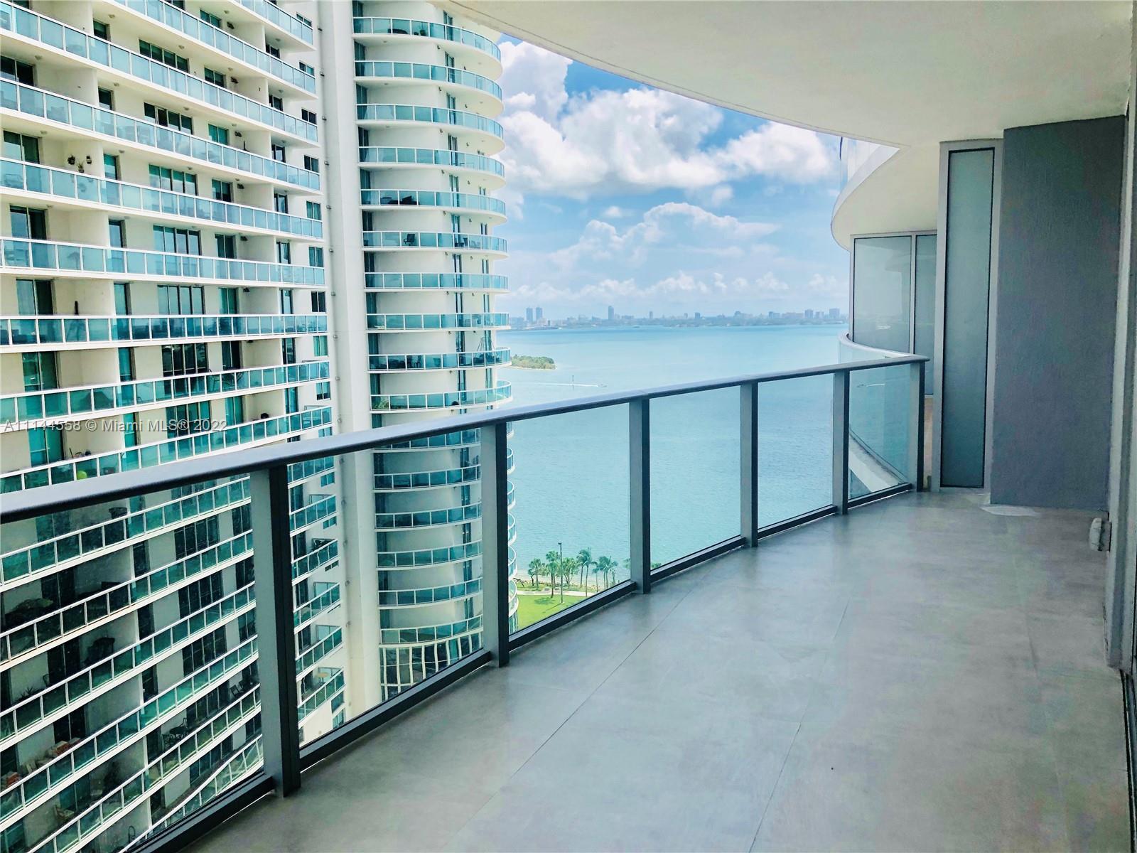 Gorgeous waterfront building, 1 bed 1.5 bath condo on desirable Aria on the Bay, city skyline and Ba
