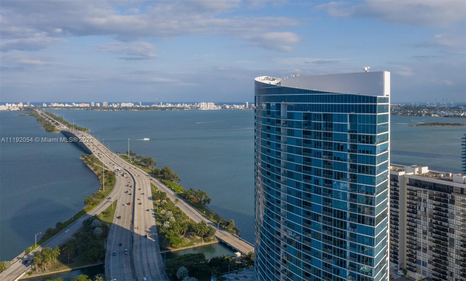 Incredible Waterfront residence with unobstructed Miami Bay views!!!  Open layout with updated kitch