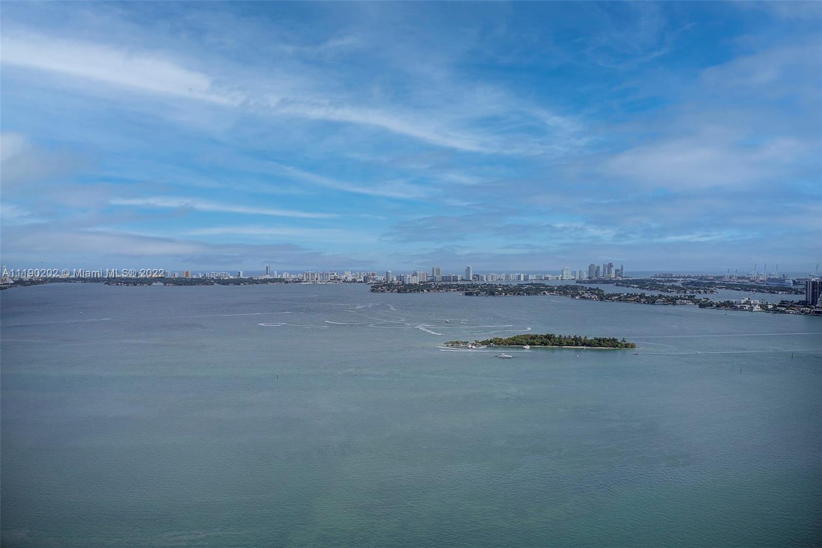 Stunning DIRECT Biscayne Bay views from this oversized 3 bedroom floorplan corner unit. Featuring 3 