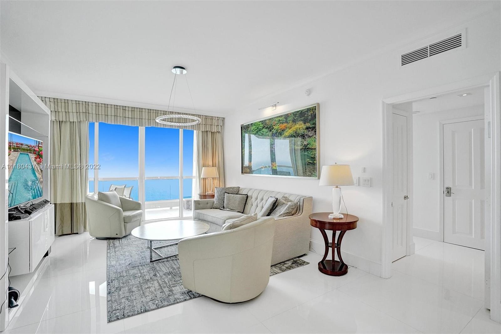 BEACHFRONT! Rarely available 04 model, perfectly situated on the 35th floor at the prized Acqualina 