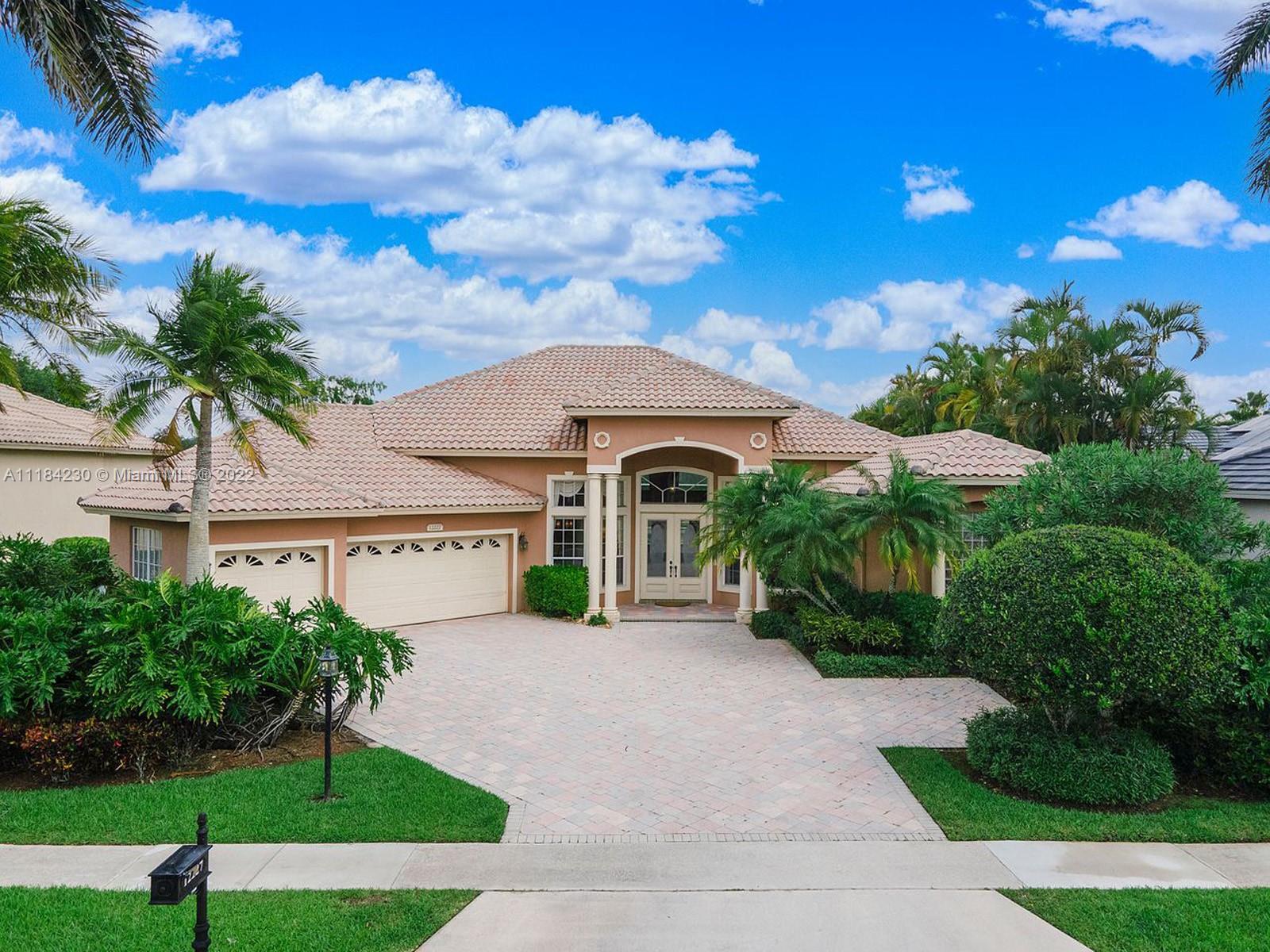 STUNNING 4 BEDROOM PLUS DEN, 3.5 BATH HOME IN BOCA FALLS.  THE HOME IS LOCATED IN THE CRYSTAL POINTE