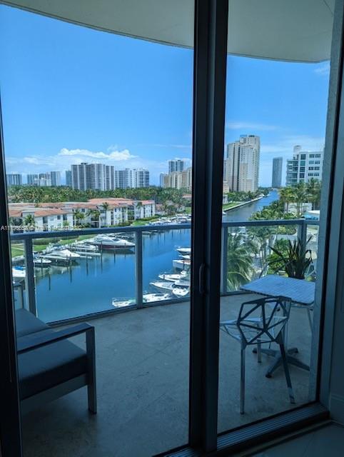 These lofts have the A/C ducts exposed, 11' ceilings of impact glass  overlooking the marina.   This