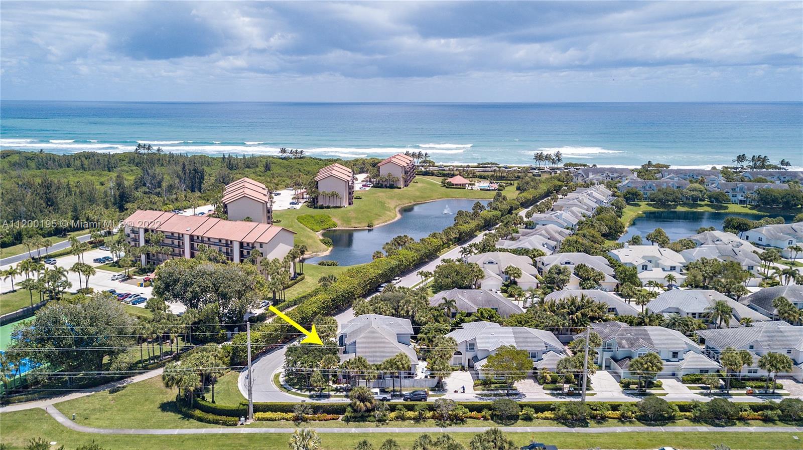 Rarely available TH in this gated sea-side community! Enjoy the ocean breezes and sunrises in this s