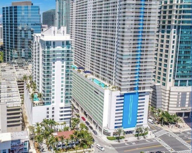 Perfect marble tiled apartment in boutique building nestled between Biscayne Bay and Brickell Avenue