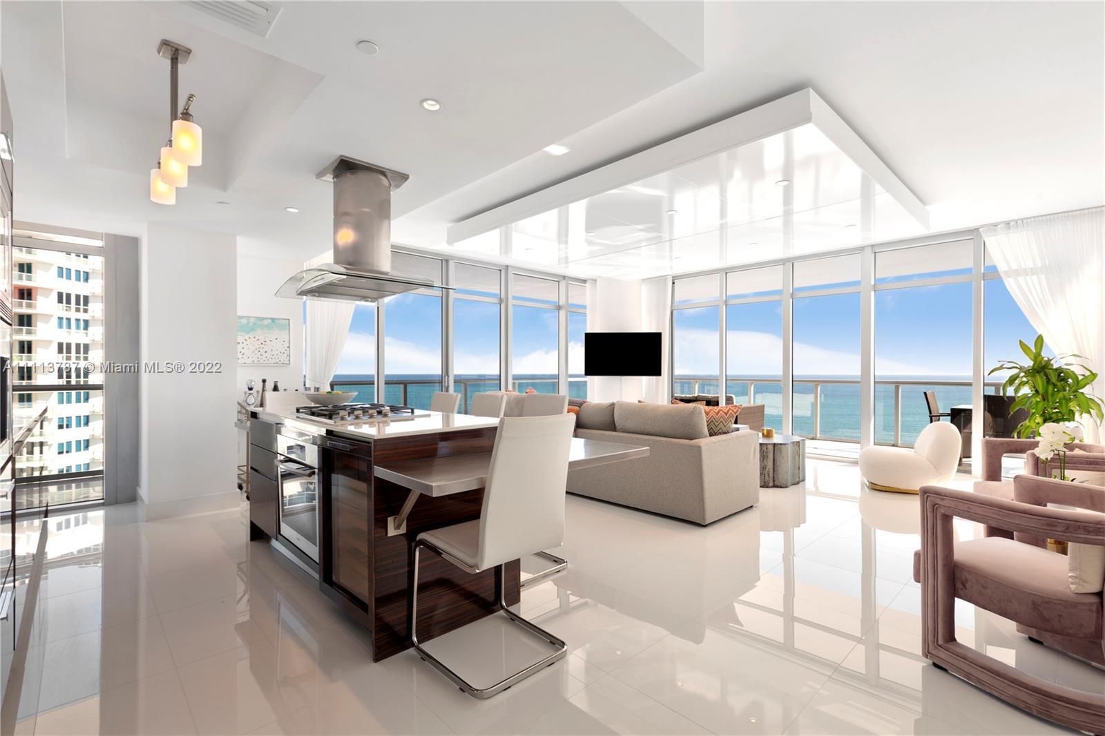 Newly renovated rarely available high floor direct ocean unit at The Caribbean. Floor to ceiling gla