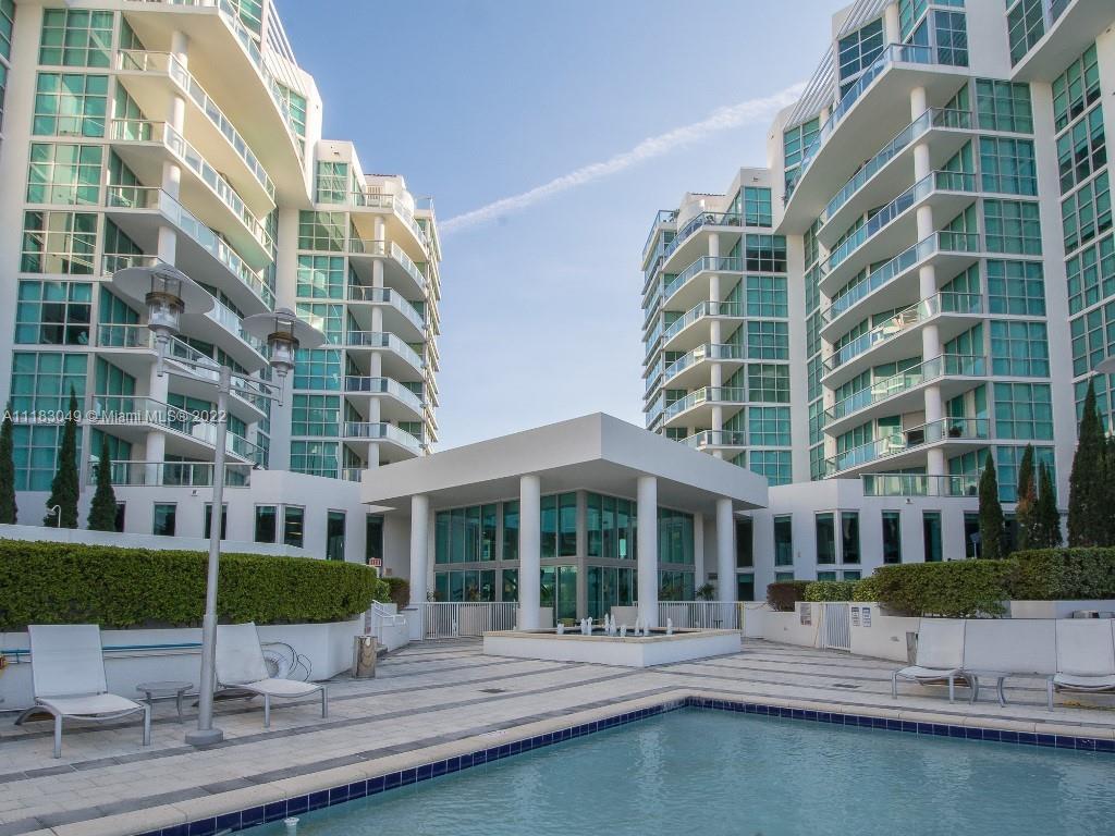 Amazing building in Aventura. This bright and spacious two-story unit with open balcony is like livi