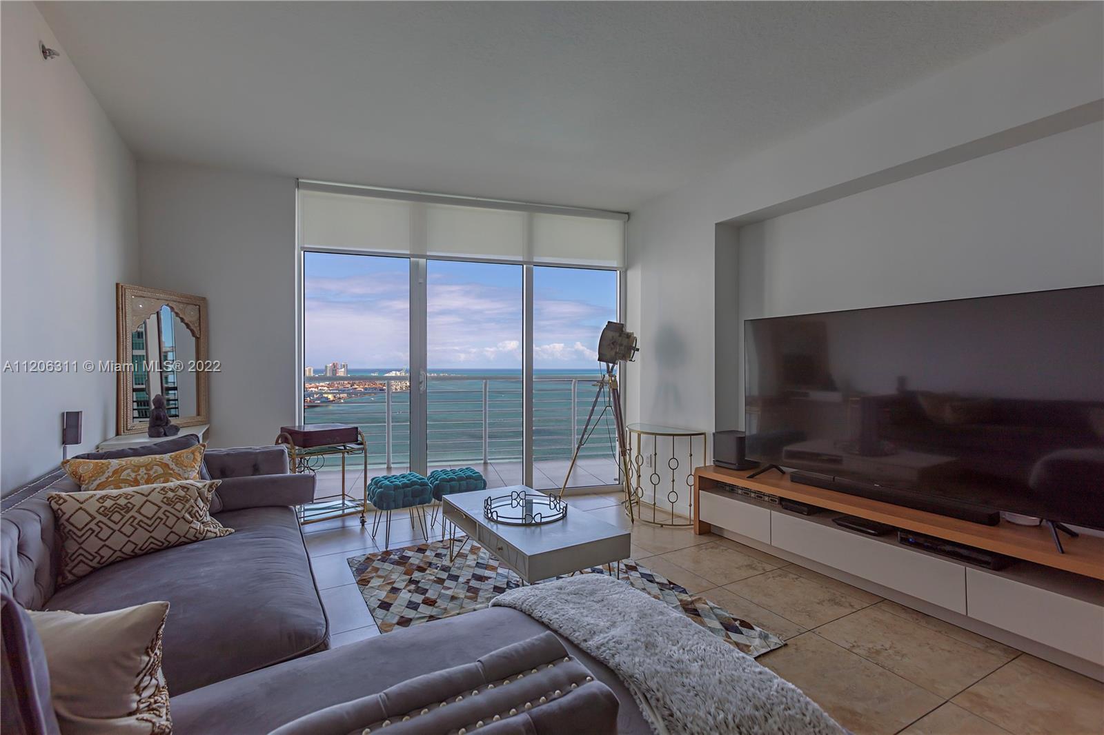 This amazing 3/2 corner unit offer the most spectacular unobstructed views of Biscayne Bay, Port of 
