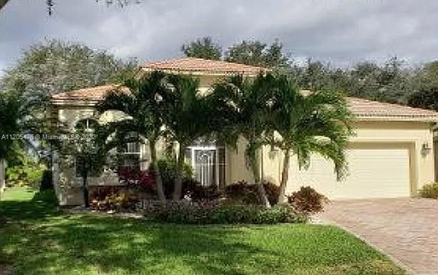 Beautiful Tuscany section home in exclusive Coral Lakes. This immaculate 3 bed 2 bath home boasts a 