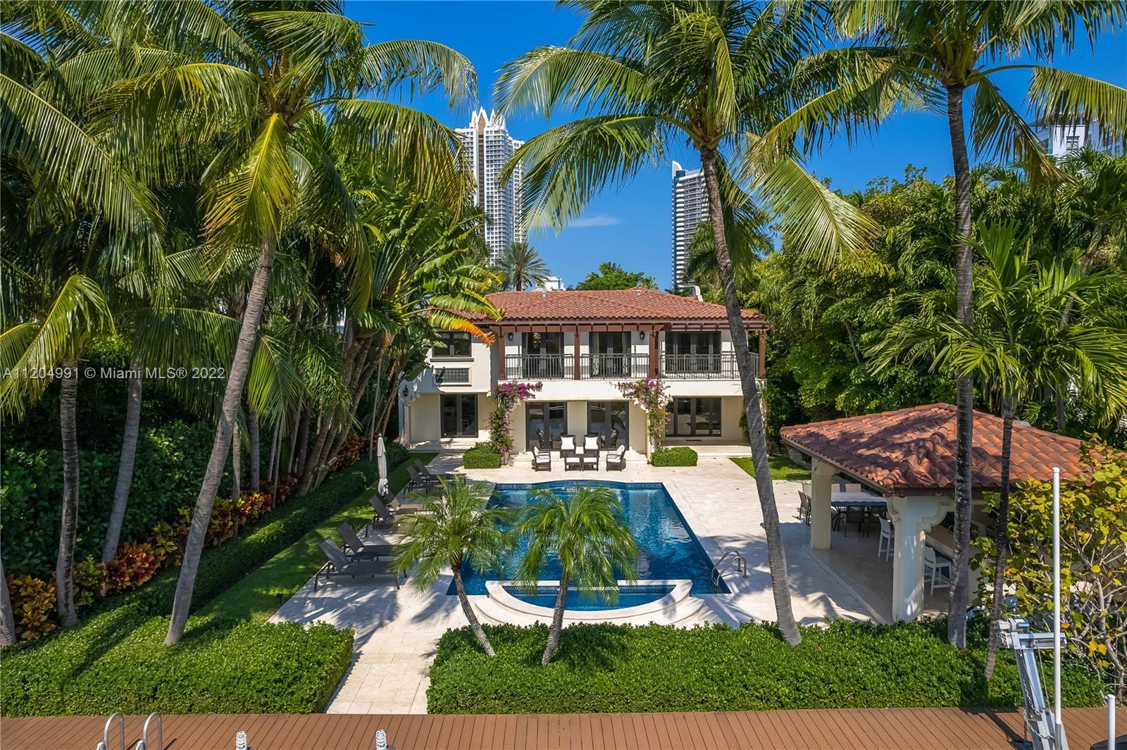 One of Miami's most sought-after waterfront islands! Sunsets & sweeping wide water views from this w