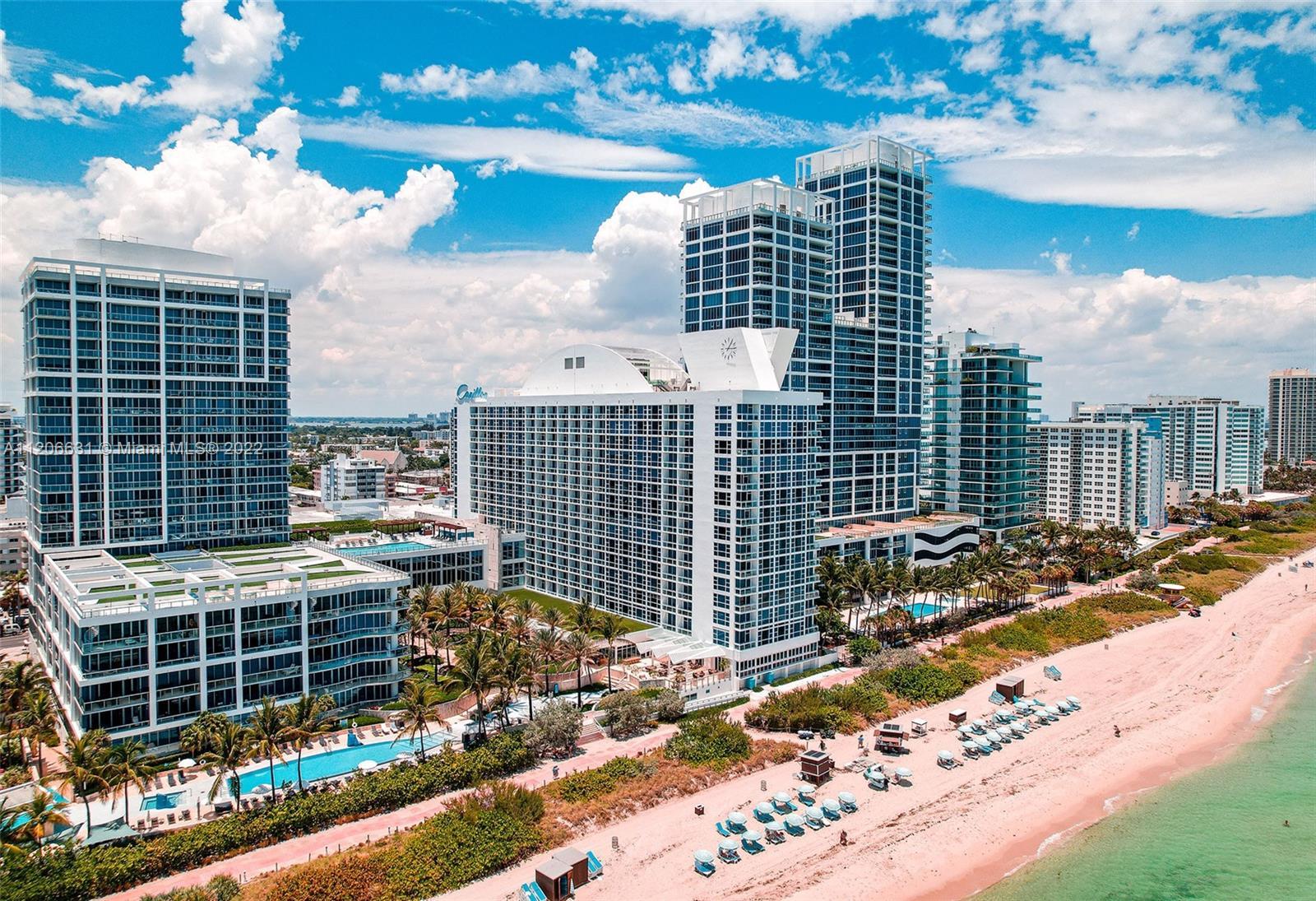 Carillon Hotel & Spa , a premier oceanfront resort. Ocean & Palm Court views from floor-to-ceiling w