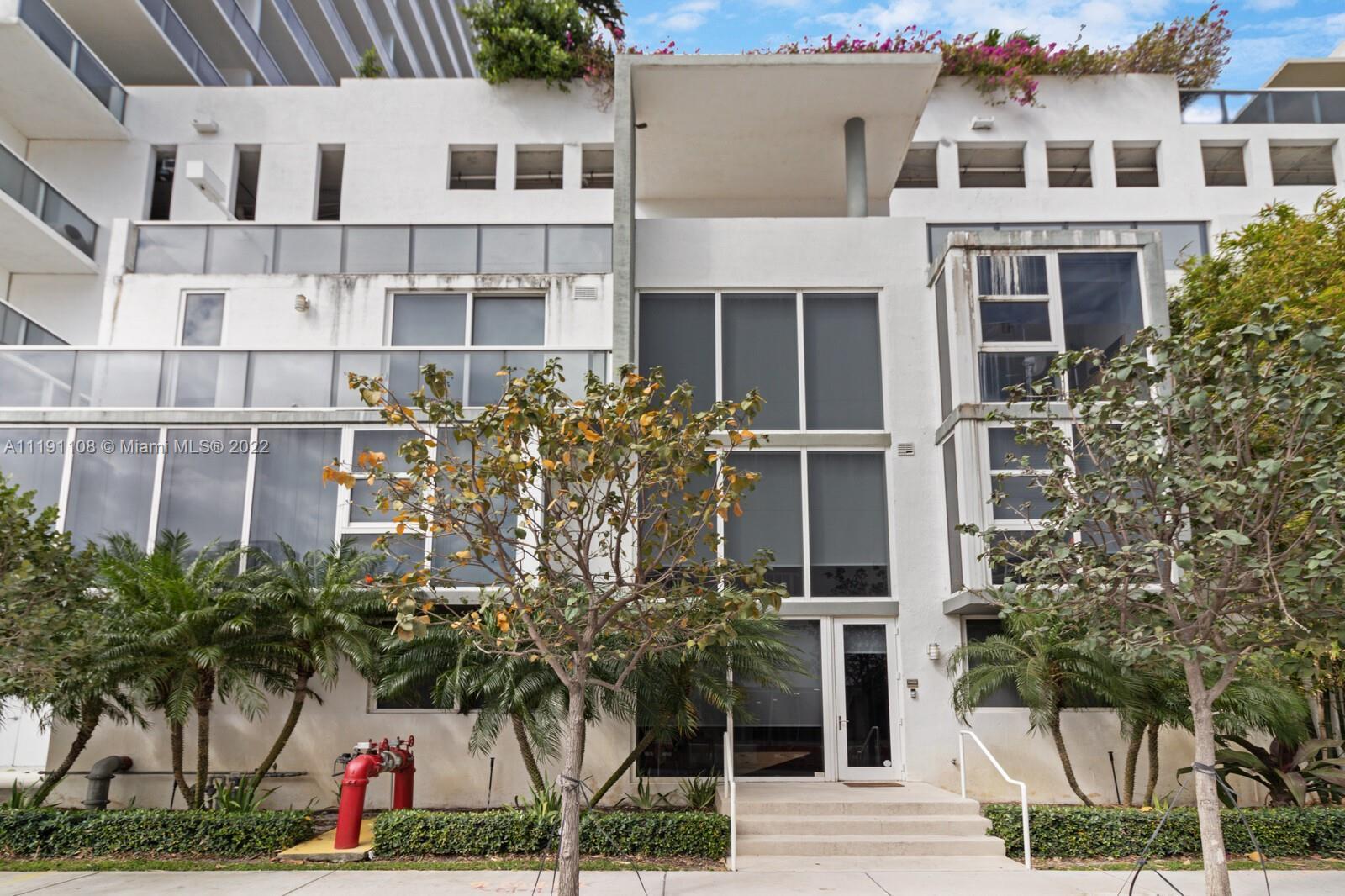 Rare gem in the heart of Edgewater! Street level access Townhome at the Exclusive Bay House Residenc