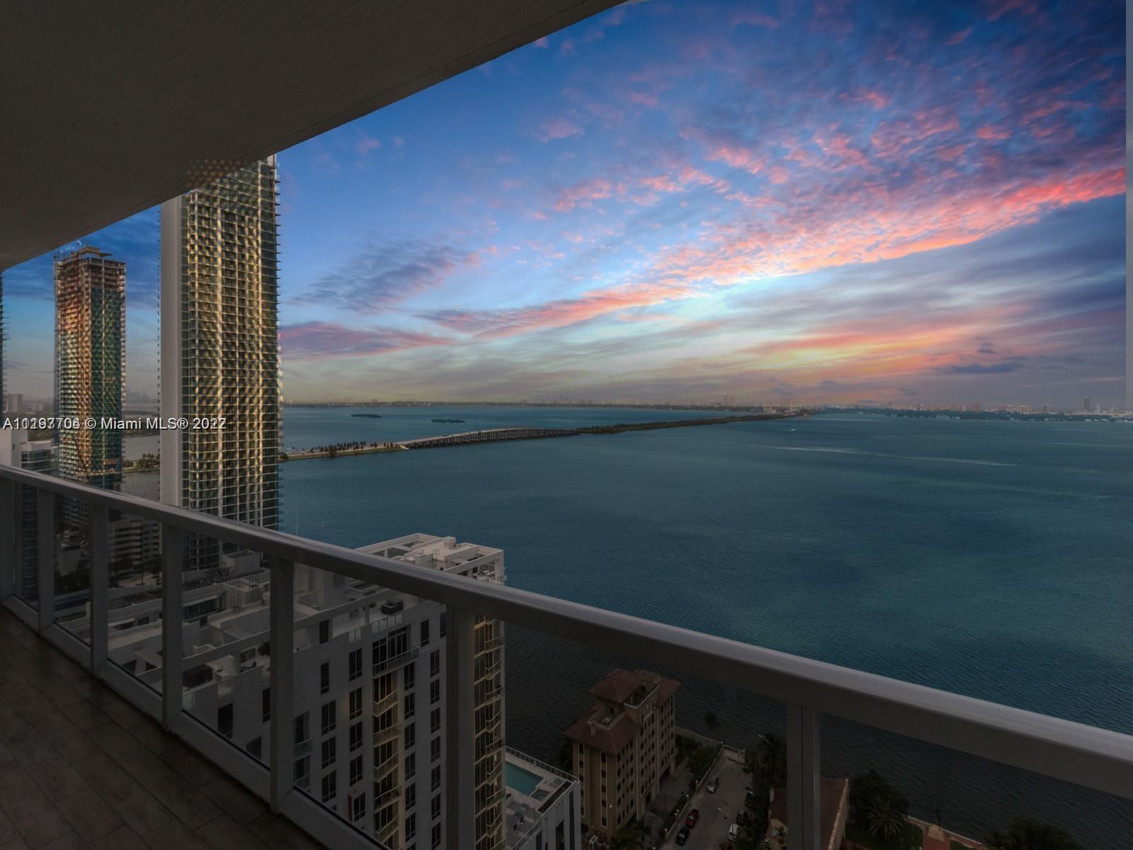 Enjoy direct unobstructed panoramic Biscayne Bay views and ocean breeze from this beautiful 3 bed/3 