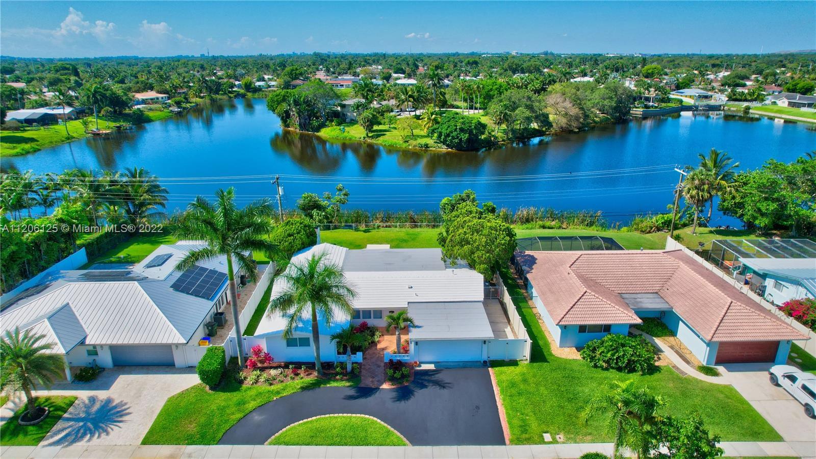 WOW!!! Rare direct wide Lake front home w/ one of the best water views in Boca.  Great for fishing a