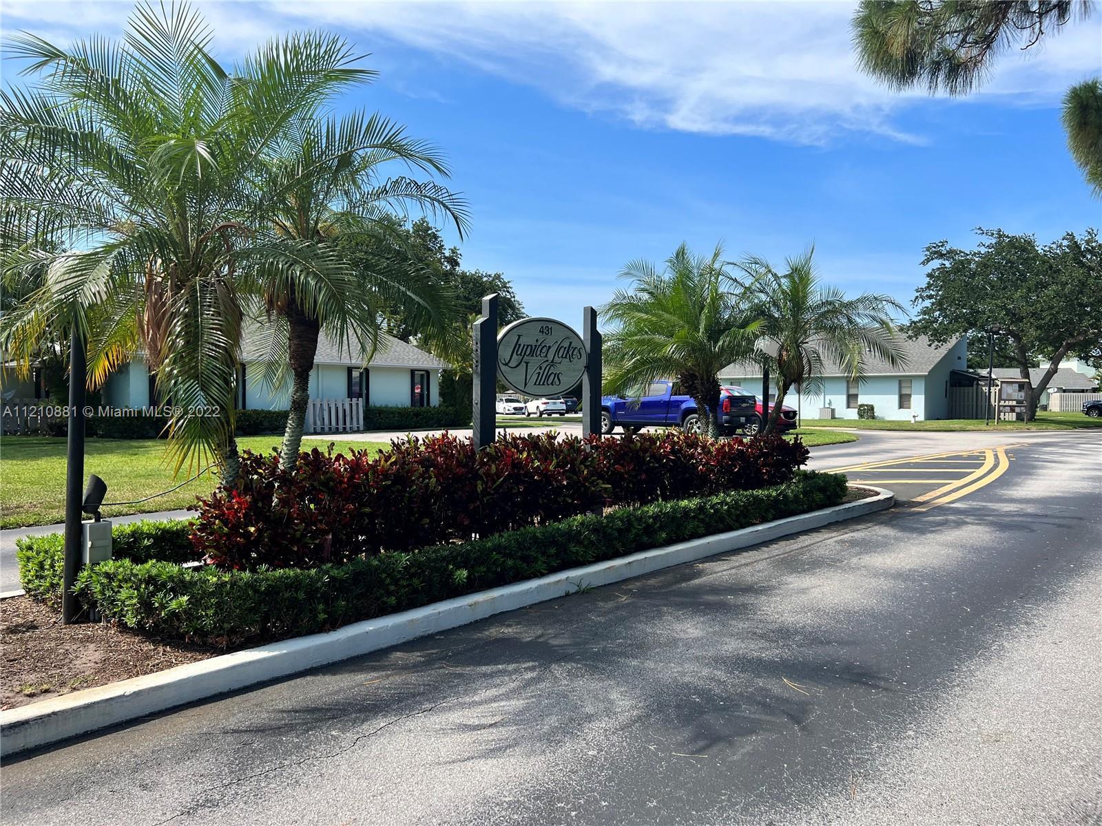 COMPLETELY RENOVATED MOVE-IN READY VILLA IN JUPITER LAKES VILLAS WITH BRAND NEW AC, NEW ROOF AND HIG
