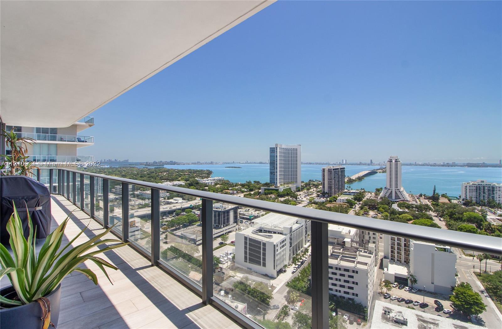 Amazing corner unit, with beautiful unobstructed views of Biscayne Bay. Open Floor plan design with 