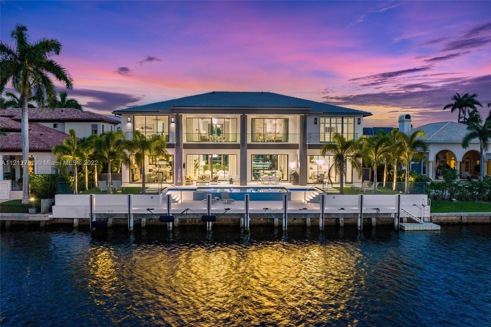 Welcome to 169 W. Key Palm Road in Boca Raton, a visionary display of architectural intrigue and sof