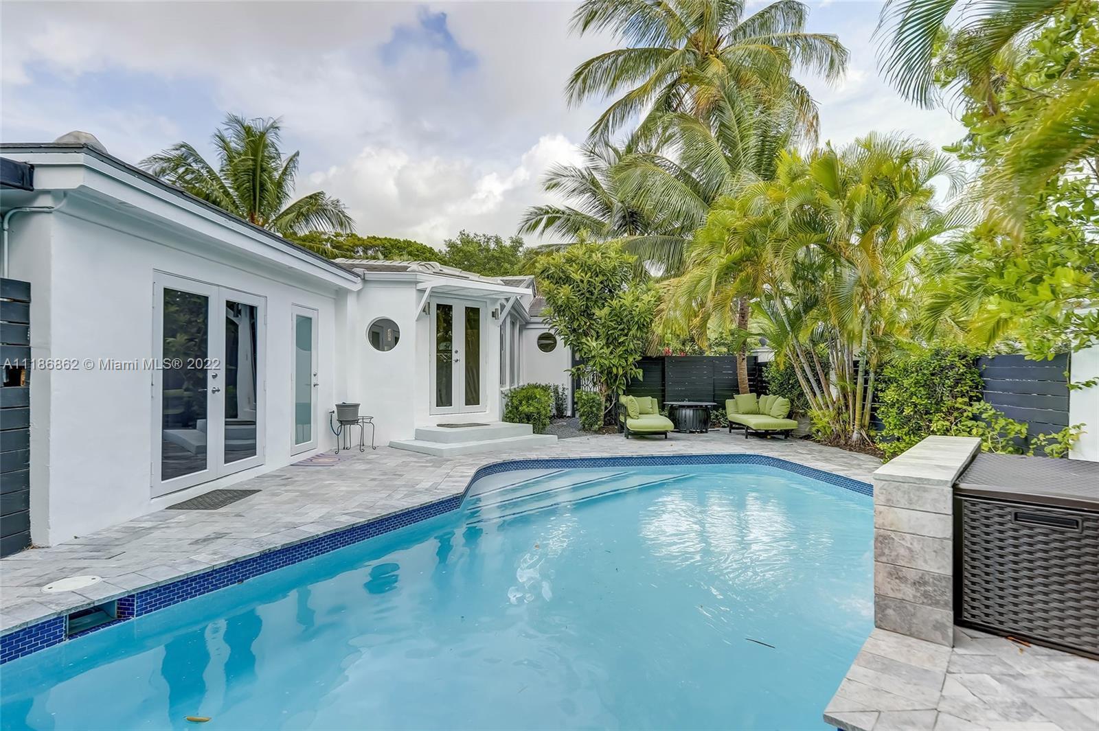 A haven of serenity in the heart of Fort Lauderdale, this 4 bd, 4 ba oasis takes elevated living to 