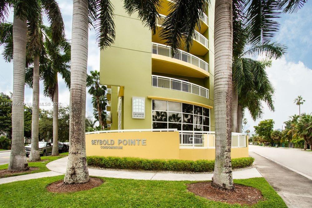 Rare find in an amazing location! This unit is the largest, most sought after floor plan in Seybold Pointe! 1067 square ft. under air with a balcony that is almost 300 square feet! Great split floor plan. 2 bedrooms/2 bathrooms. Washer and dryer inside unit. Great view of the Miami River and Loan Depot Park(Miami Marlins) and their fireworks displays! Newly redone kitchen with stainless steel appliances. Wood floors throughout with the kitchen tastefully tiled. THE UNIT INCLUDES 2 DEEDED AND COVERED PARKING SPOTS! Impact windows. The building features rooftop amenities that include a gym and a party area with a kitchen. Building equipped with monitored security cameras and has secure lobby and elevator entry. Minutes to UM Med, Jackson Mem,