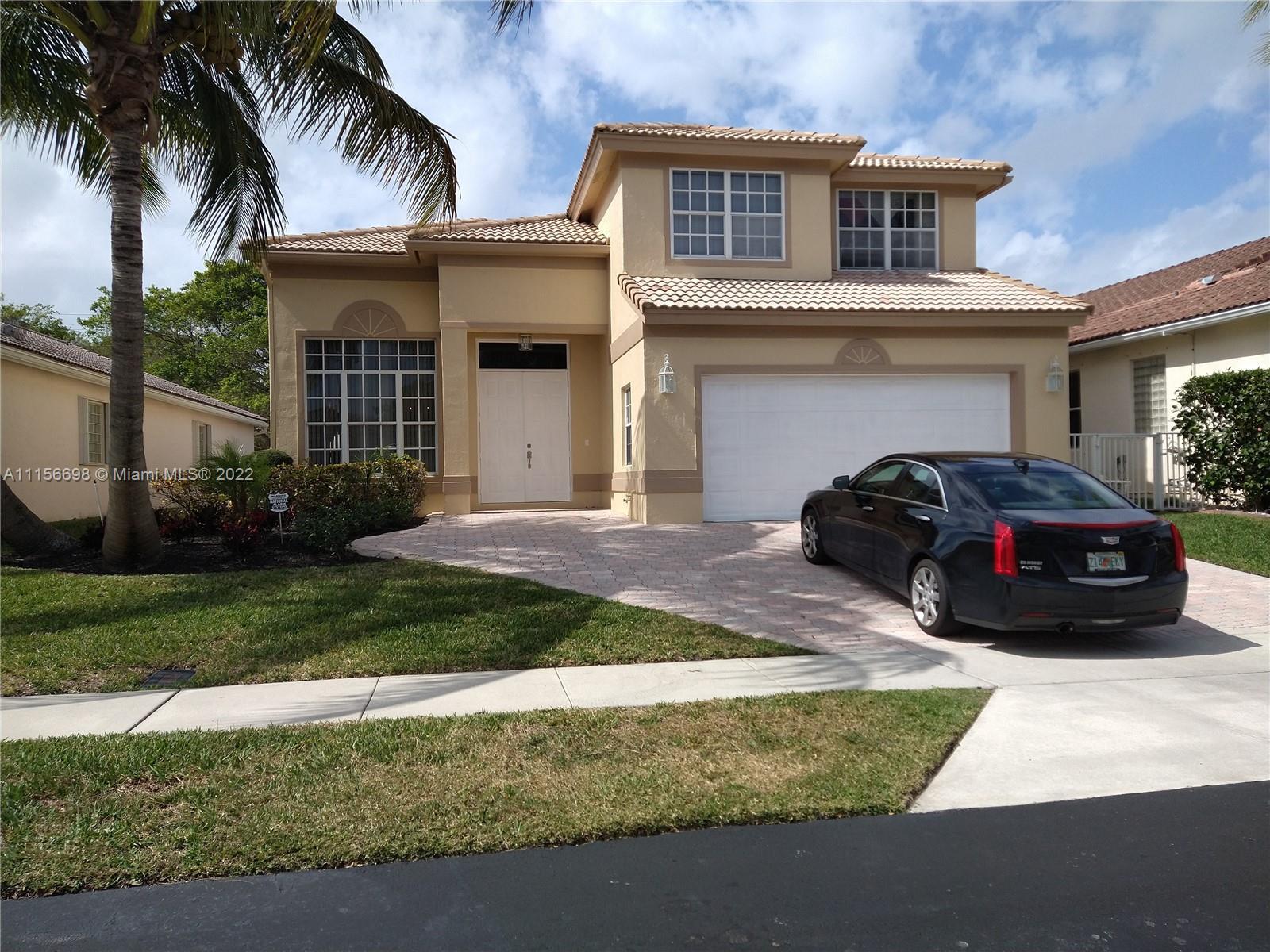 Beautiful former model home in the exclusive gated community of Boca Preserve. 4 bedroom 2 1/2 bath,