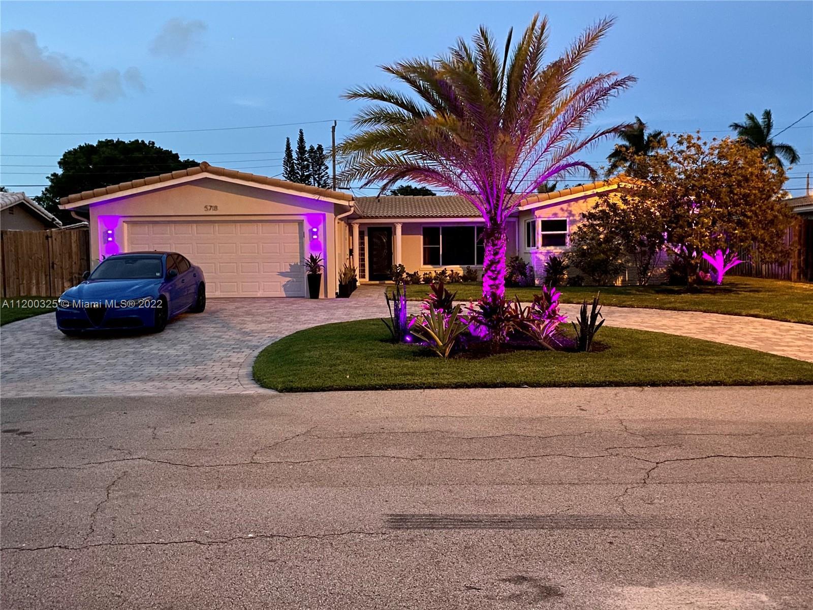 Modern masterpiece in Coral Ridge Isles. Situated on a beautiful interior street, this home contains