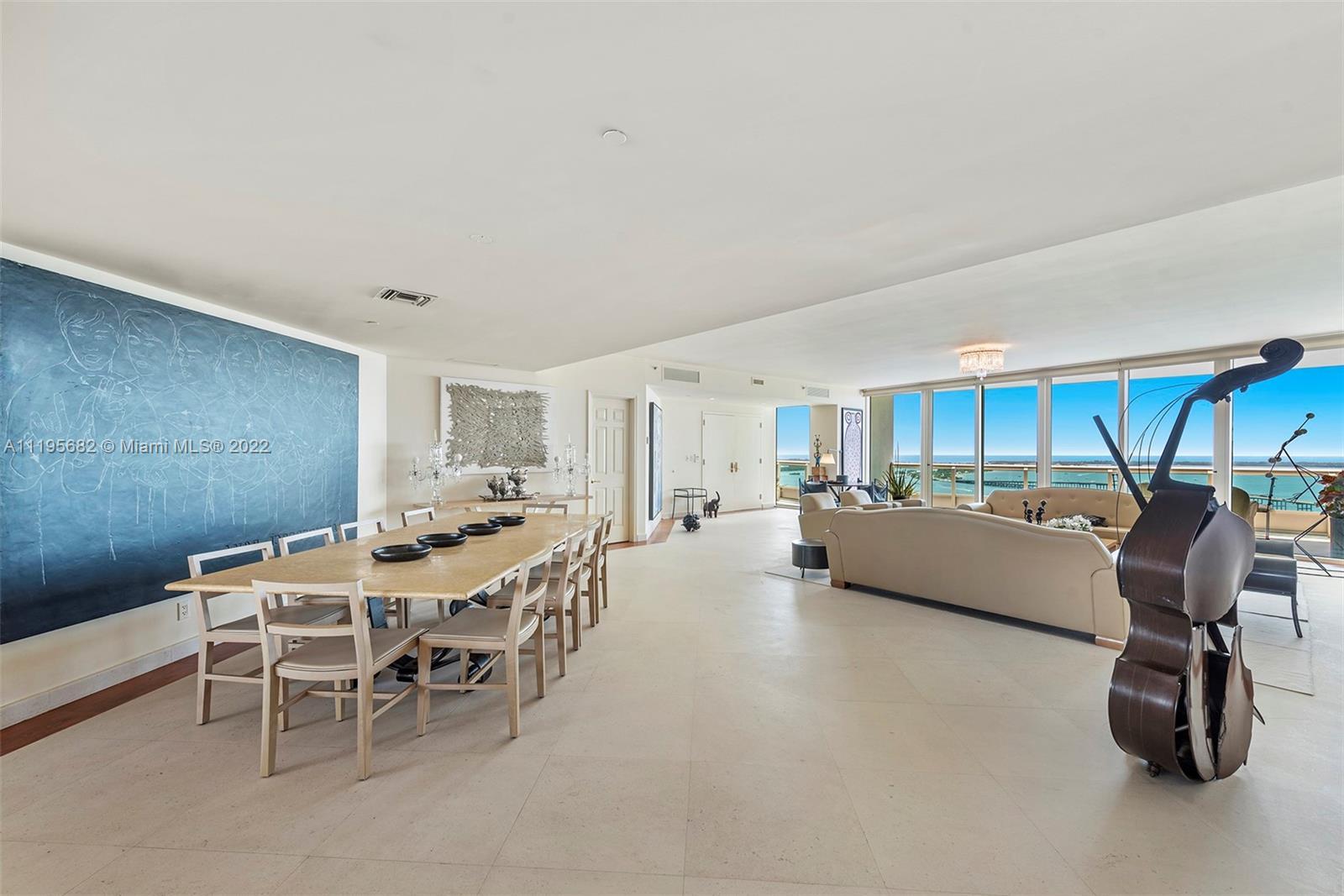 Sensational flow-through residence on the 33rd floor at the Santa Maria offers direct ocean, bay and