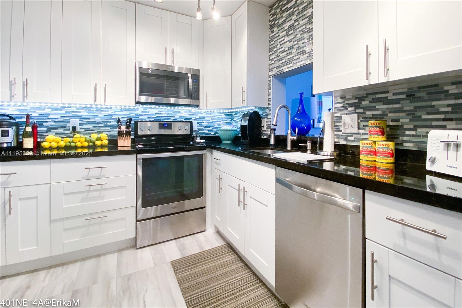 Spacious stunning remodeled 2/2 corner unit. Turn-key, move-in ready. High-end furniture stays excep