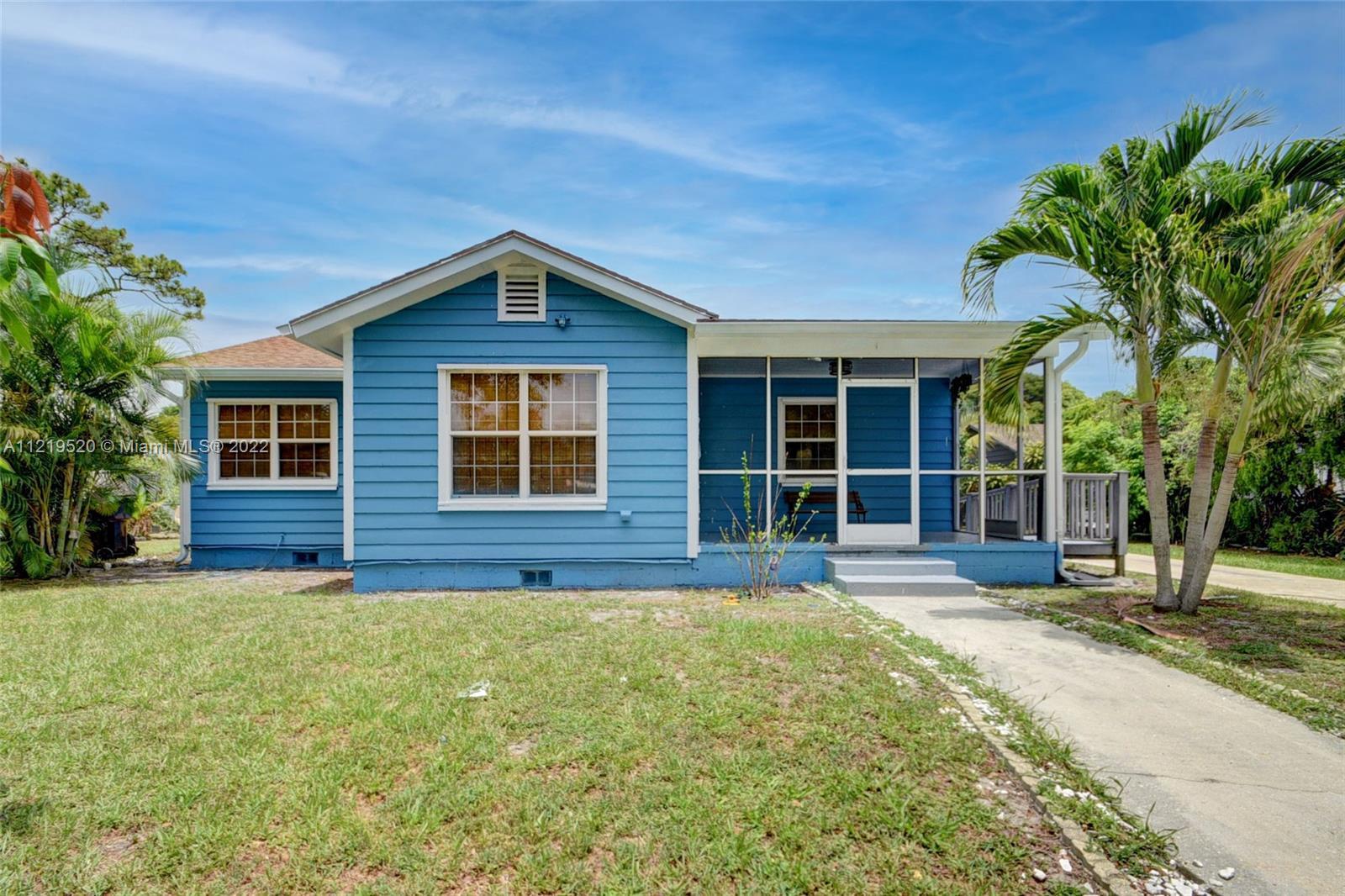 MOVE IN READY! Situated on a tree lined street in the Vedado neighborhood, located just east of I-95