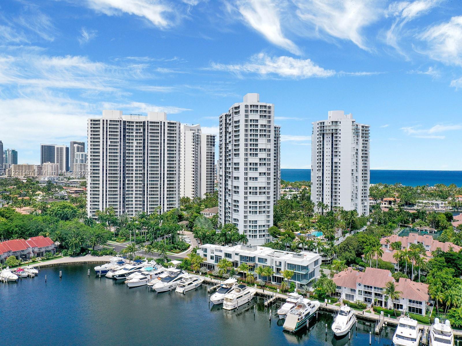 This unit has sprawling balconies with city/marina views and partial ocean views! The complex offers