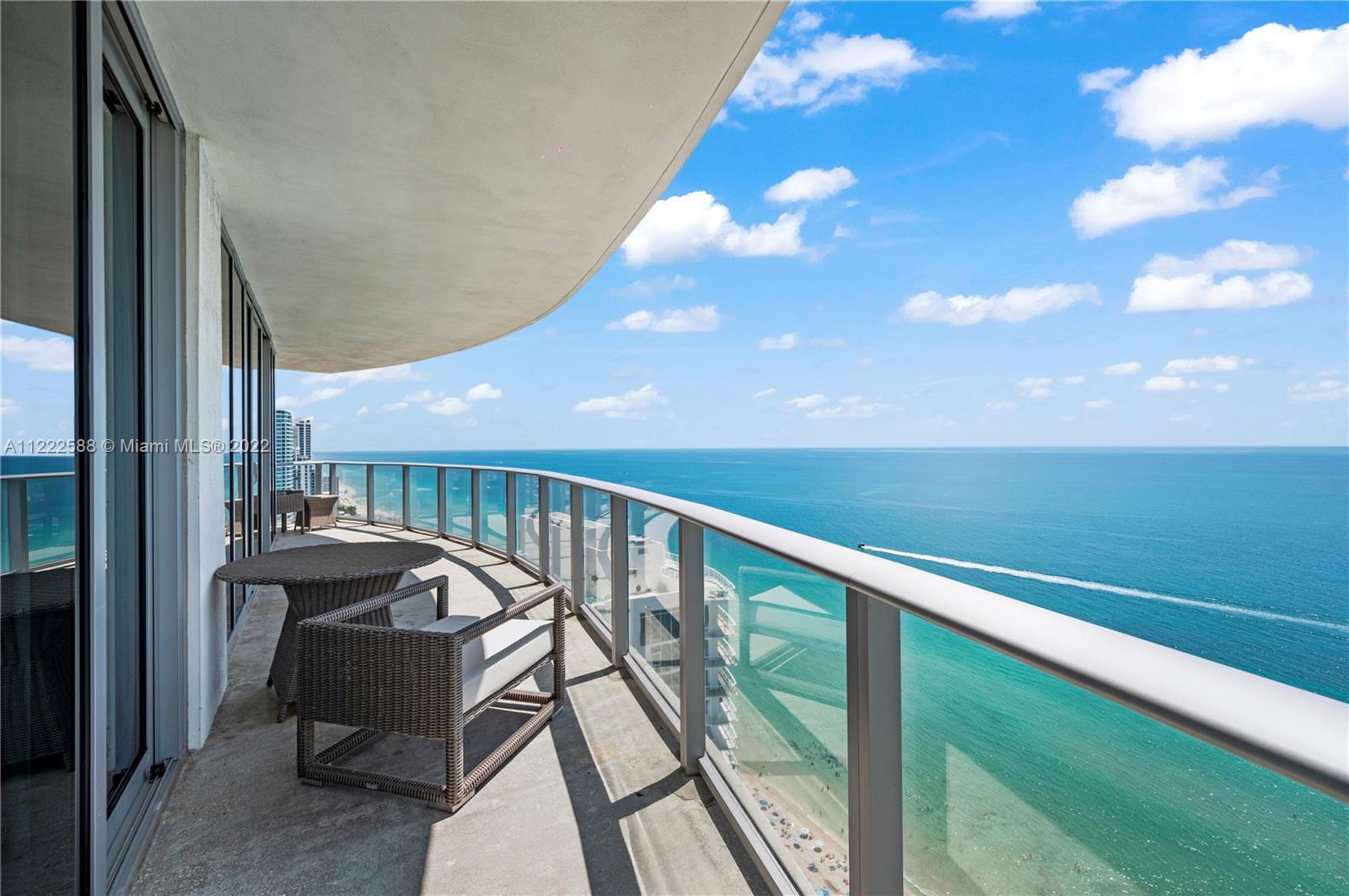Breathtaking unobstructed ocean and city views from this gem on the beach! Enjoy spectacular sunrise