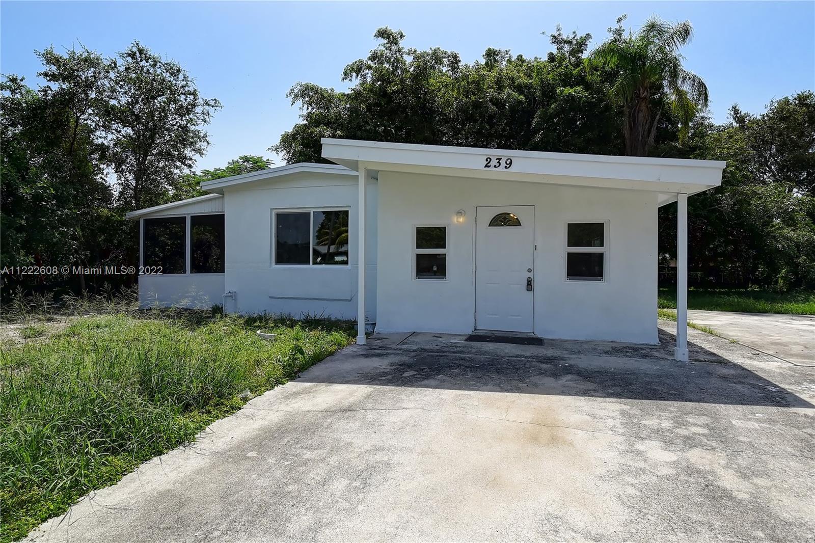 Charming rancher in the heart of Boynton Beach Florida with no association.  Fully and tastefully re