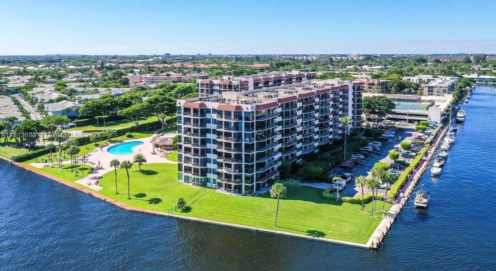 RARELY AVAILABLE BEAUTIFUL 3/2 CORNER UNIT ON THE INTRACOASTAL IN BOCA RATON! UNIT FEATURES MARBLE F