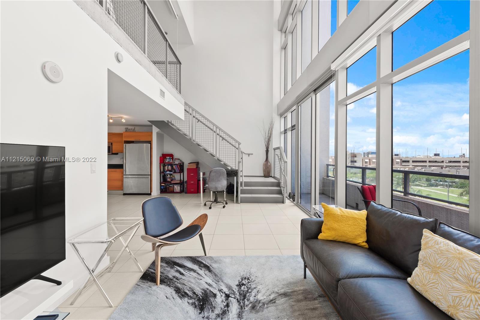 A Floor-to-ceiling 1 Bedrooms + 2 Full Bathrooms LOFT condo in the heart of Midtown, an urban design