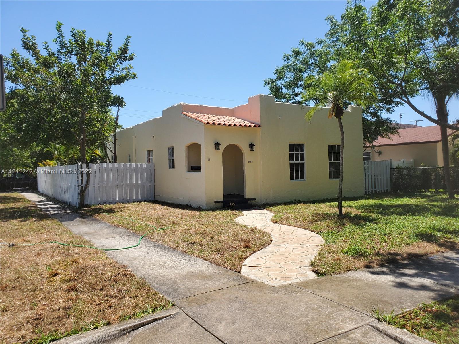EASY TO SHOW! Beautiful Spanish style tree laden corner property in a great neighborhood. Main house