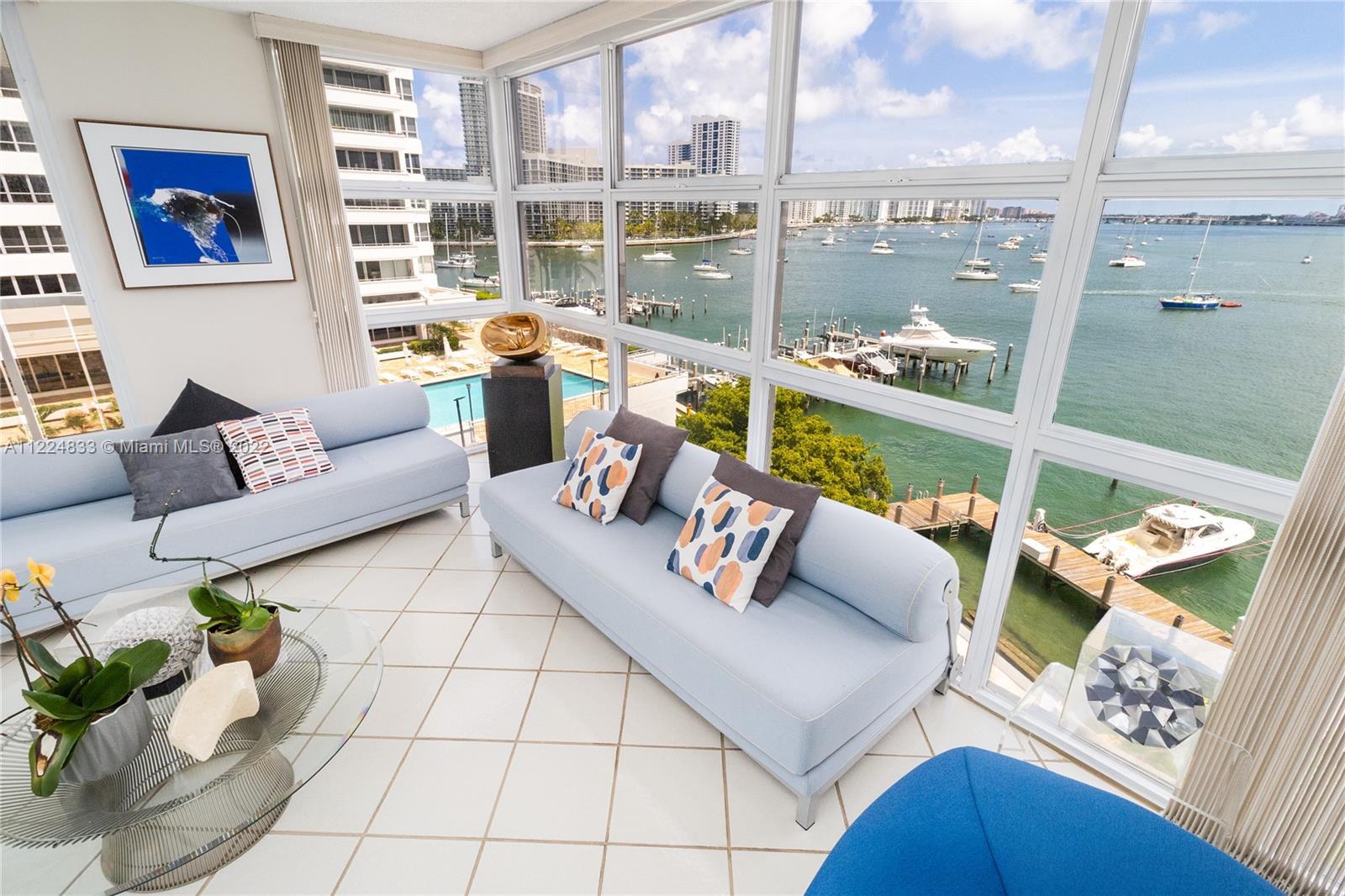 Bright and spacious corner unit with breathtaking unobstructed water views of Biscayne Bay! This apa