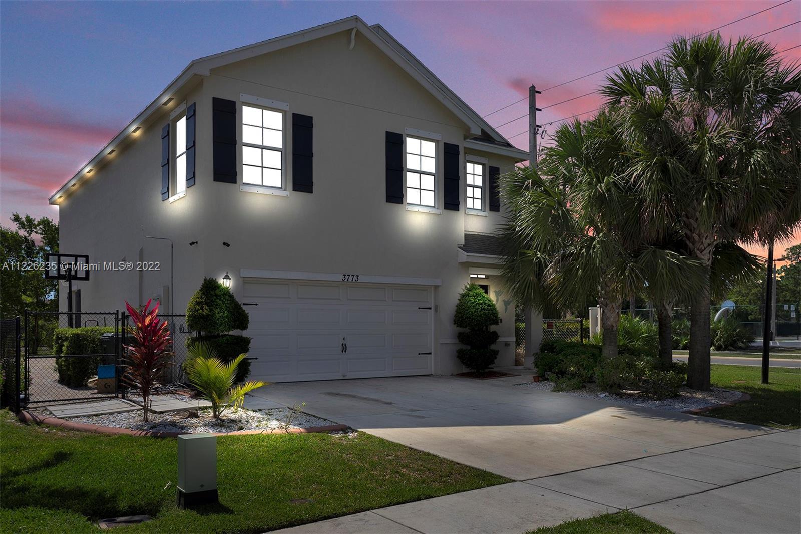 STUNNING 2-story home in the 24 home community of Whitney Park, located in the heart of Greenacres. 