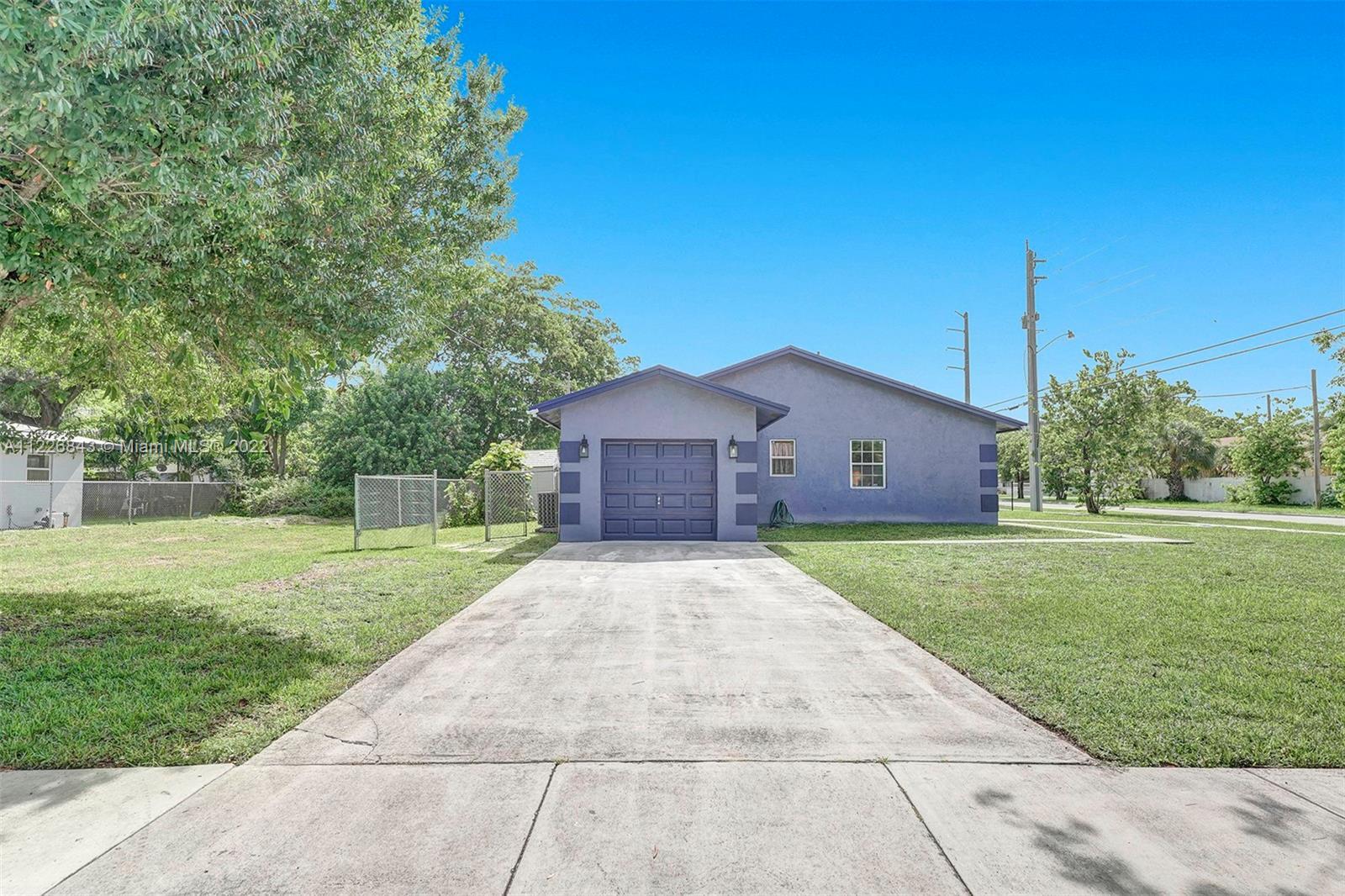 Beautiful and spacious 4 bedroom 2 bathroom single family home. Located on a corner lot.  Home has b
