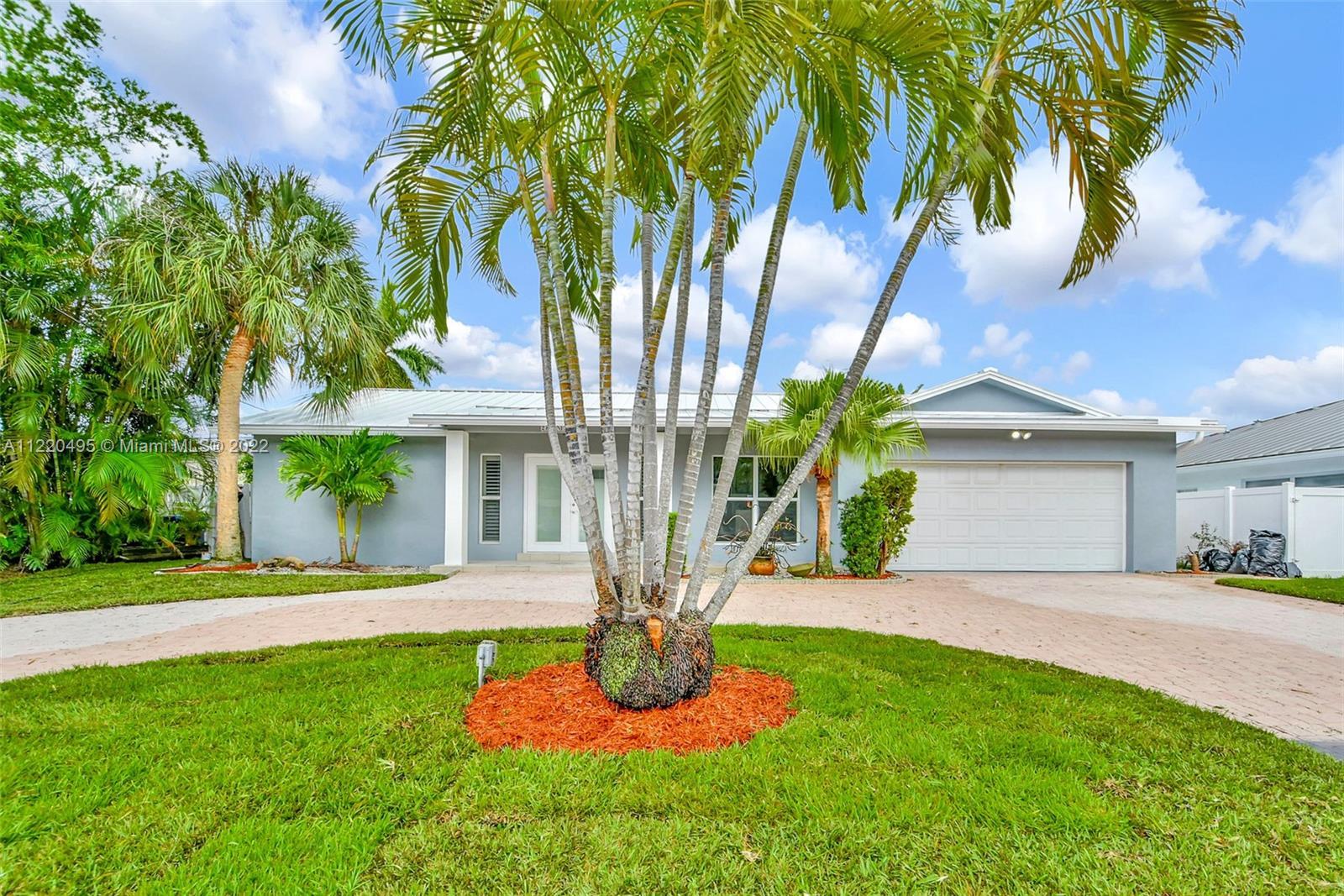 Beautiful updated home with 55 feet of tranquil waterfront in East Fort Lauderdale's sought after La