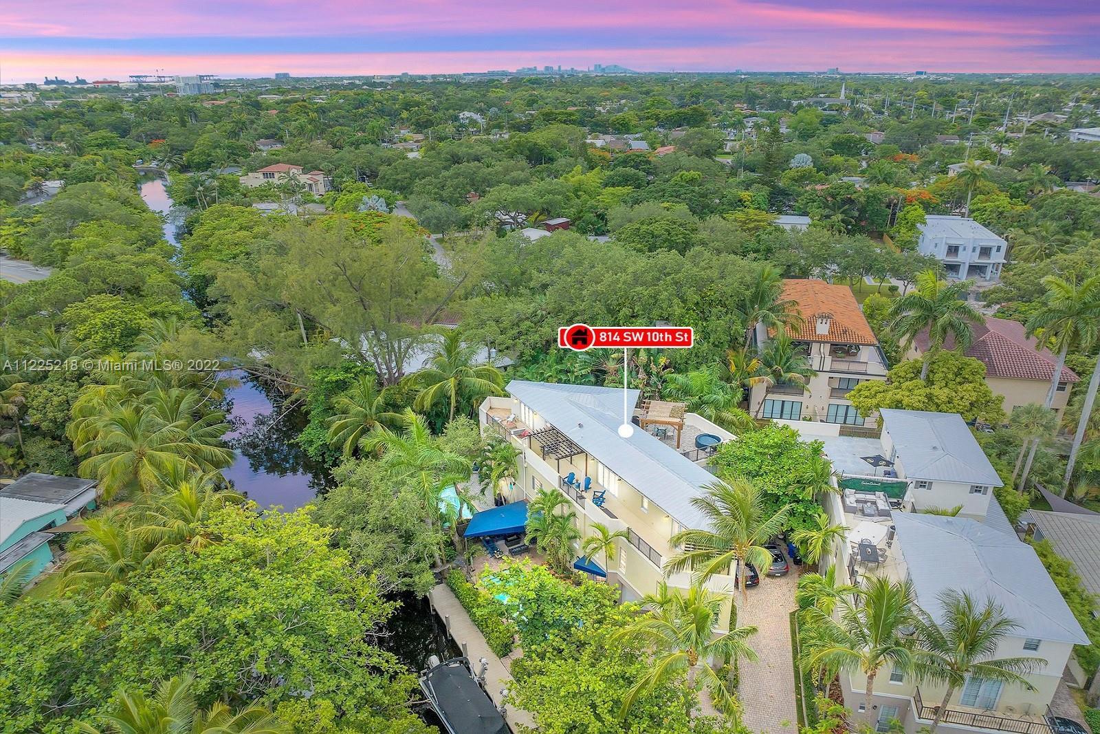 SPECTACULAR ONE-OF-A KIND TARPON RIVER TOWNHOME SITUATED ON AN ULTRA PREMIUM, SERENE & PRIVATE CUL D