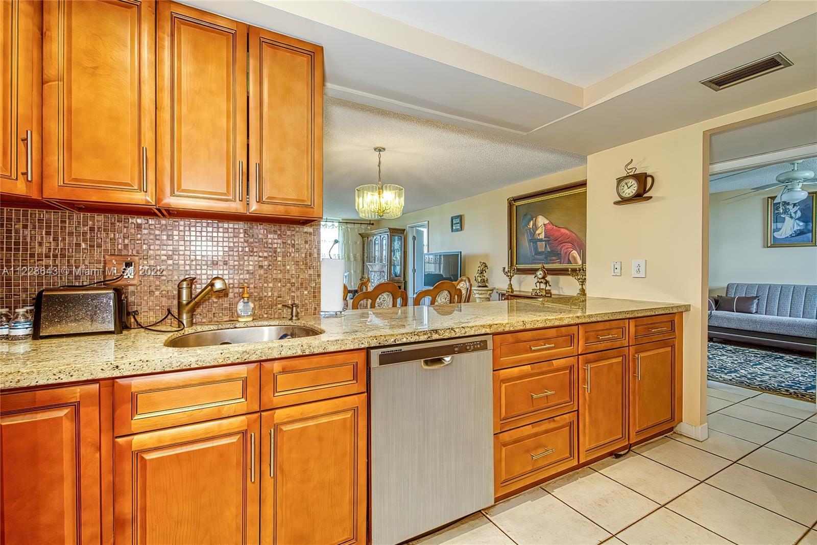 This bright and spacious three bedrooms corner unit is located in desirable East Boca Raton. It is c